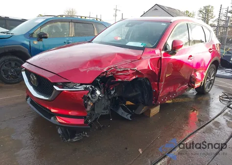 2021 Mazda Cx-5 Grand Touring z USA, uszkodzony, nr VIN JM3KFBDM2M0432134